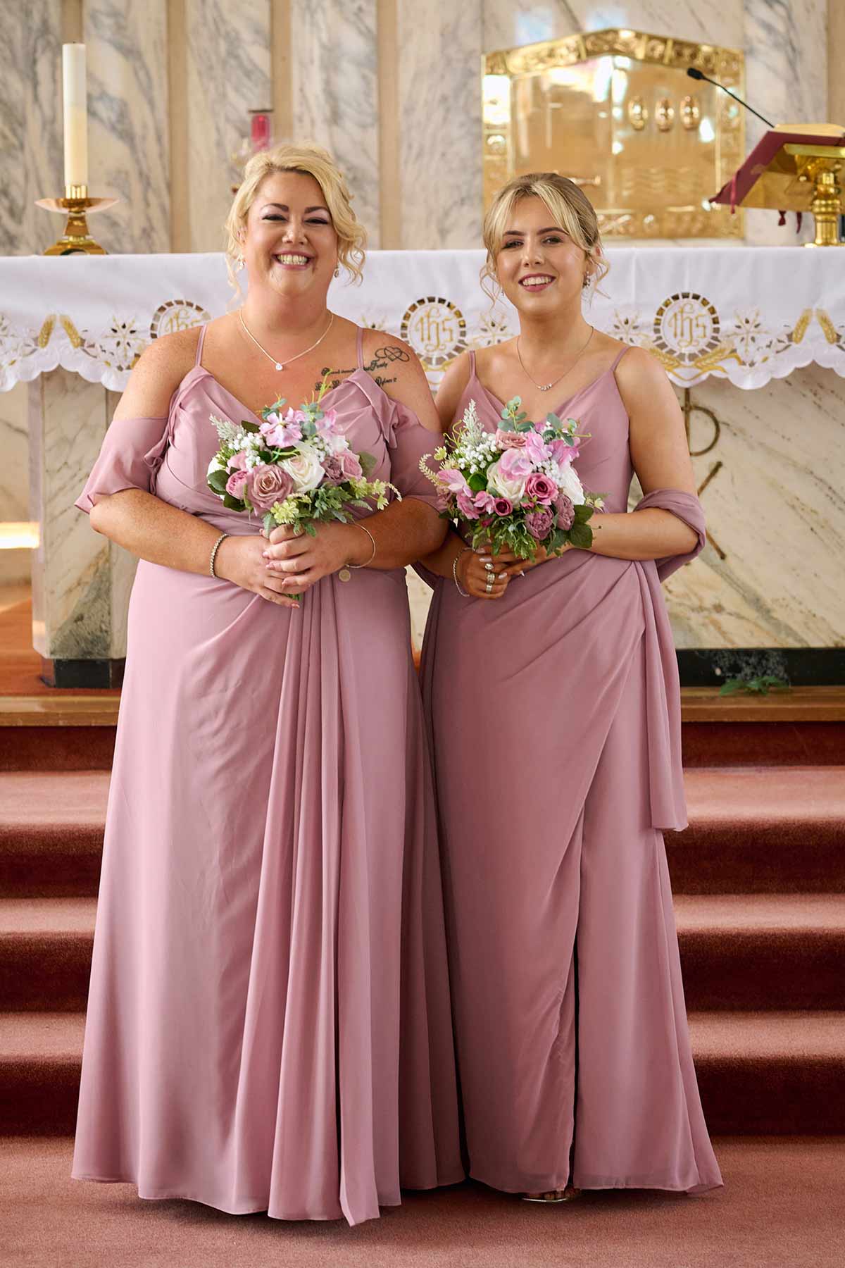 carlow-wedding-photographer portrait of a flower girl with red hair holding her flowers